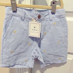 New with tags Boys size 5 Janie and Jack shorts.  Light blue w yellow palm trees